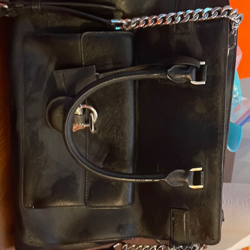 Michael Kors black purse. Never used very good condition